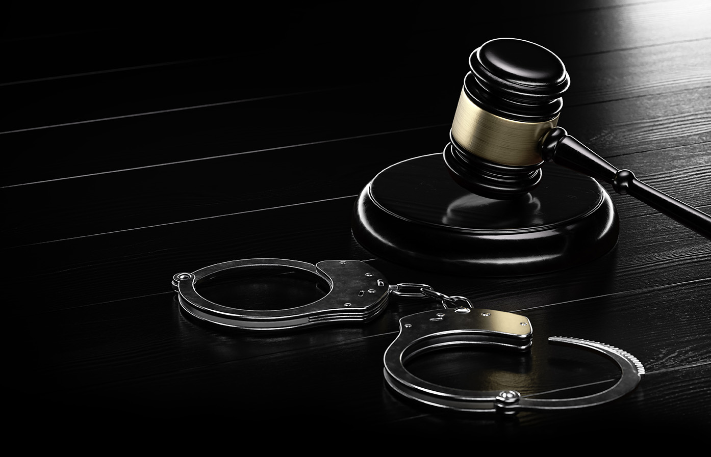 Law Legal System Justice Crime concept. Mallet Gavel Hammer and Handcuffs on black background. 3d Render illustration.